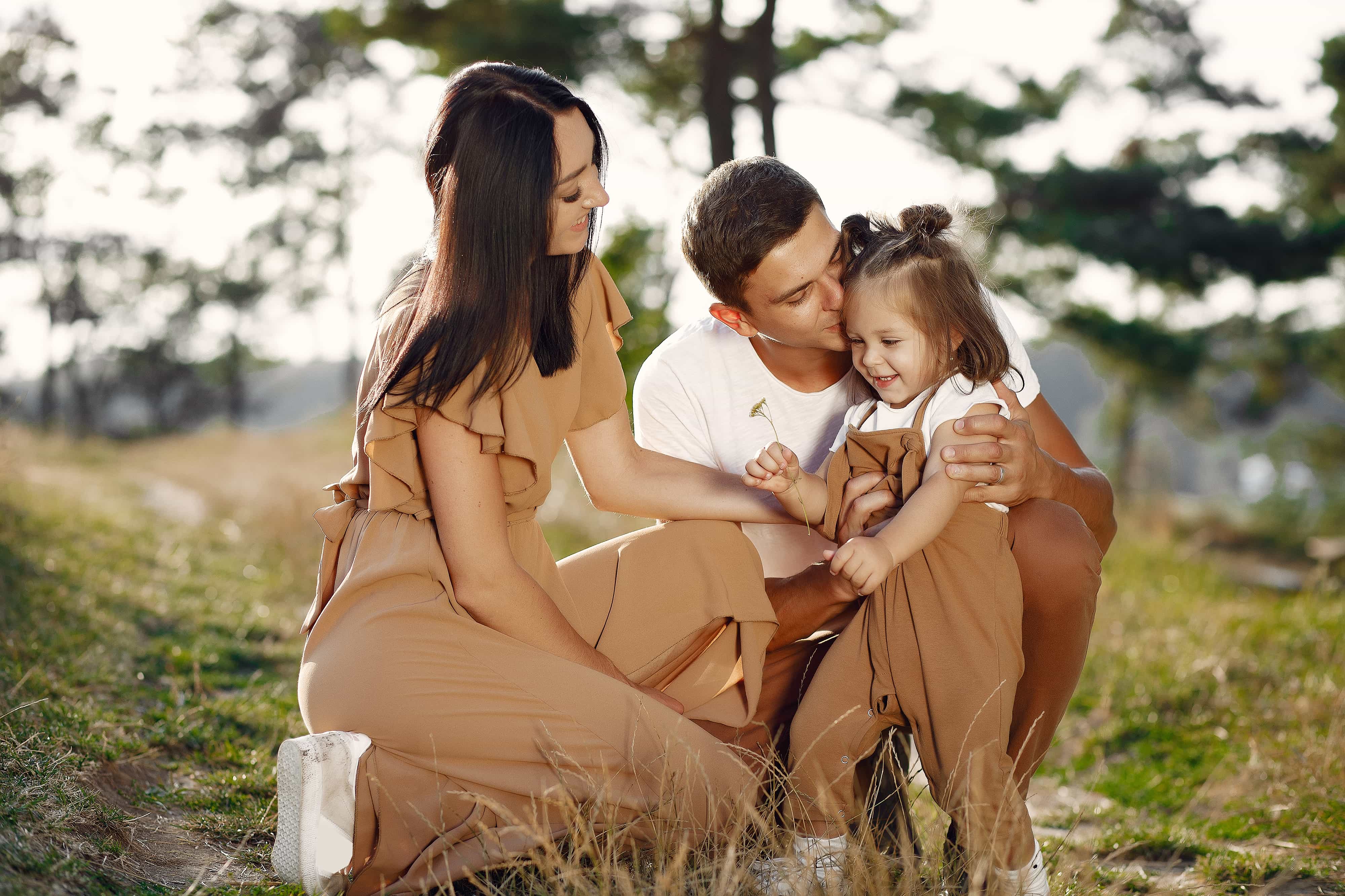 cute family playing autumn field